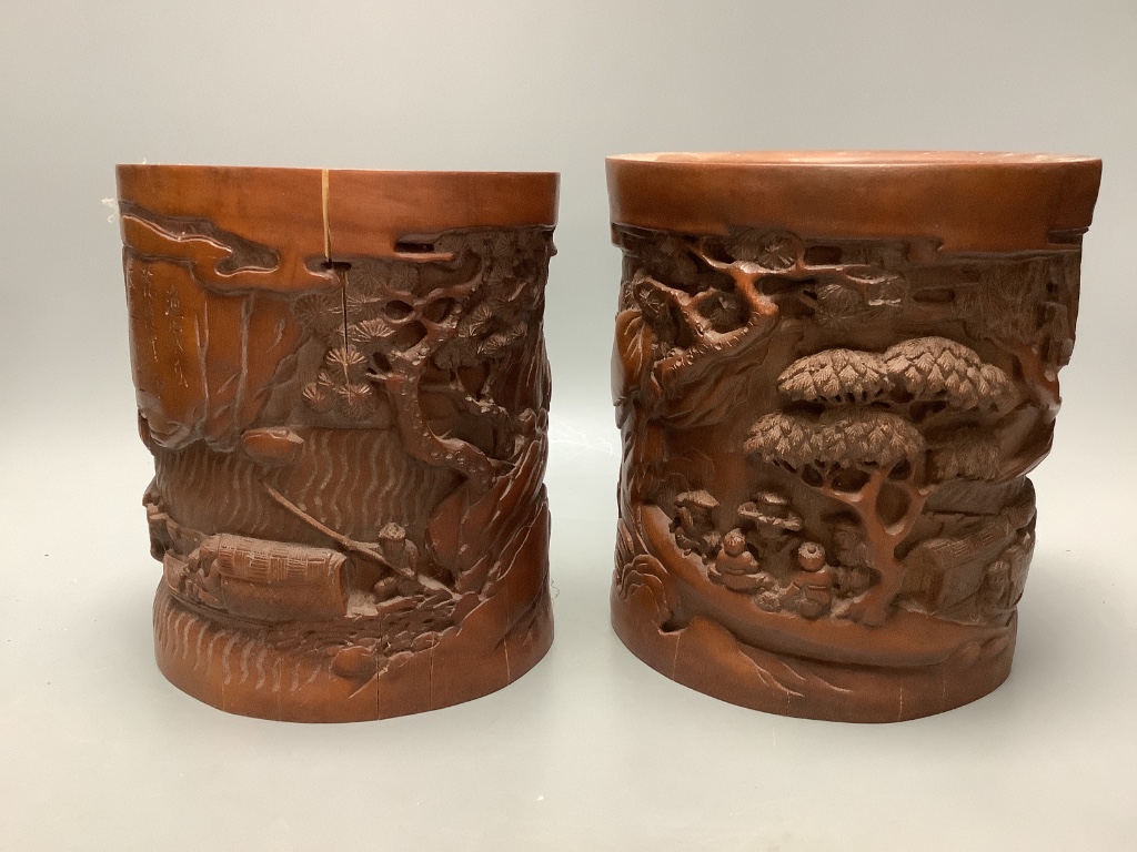 An assortment of Chinese carved bamboo and wood brush pots, tallest 17cm (8)